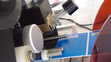 半自动圆瓶贴标机带打码机视频