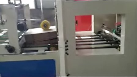 新疆新光纸箱包装机械-全自动钉箱机www.xjshengchang.com